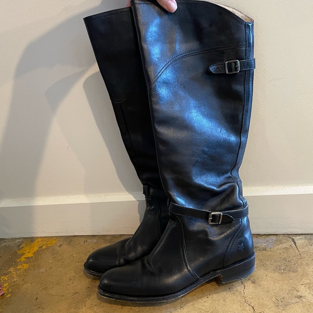 Frye riding boots 
Tan Leather Interior